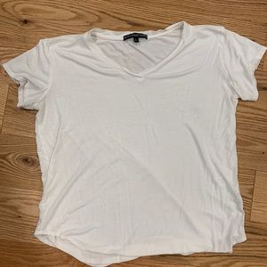 Elite Collection White V-neck top - soft and flowing